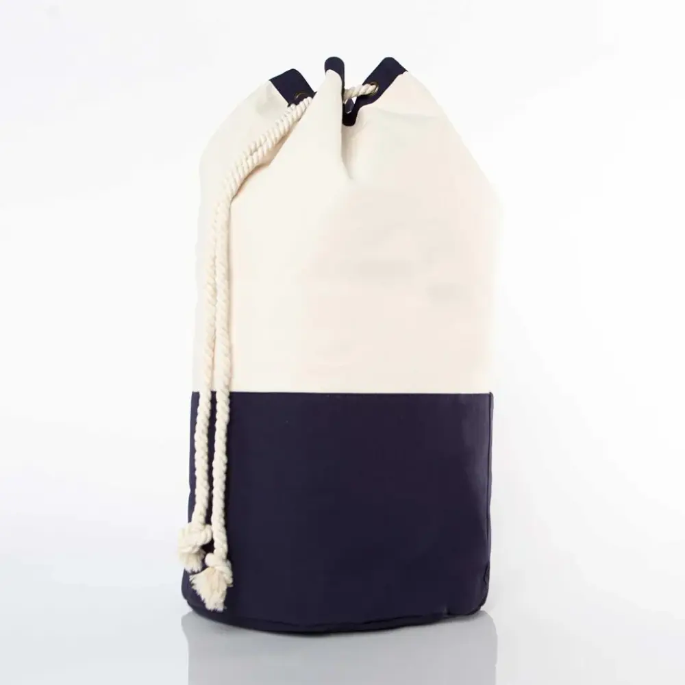 MONOGRAM CANVAS DRAWSTRING NAVY LAUNDRY DUFFLE